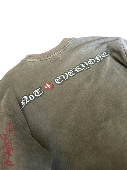 Detail of the premium 100% cotton French Terry texture and sewn logo label on the Off The Grid longsleeve.