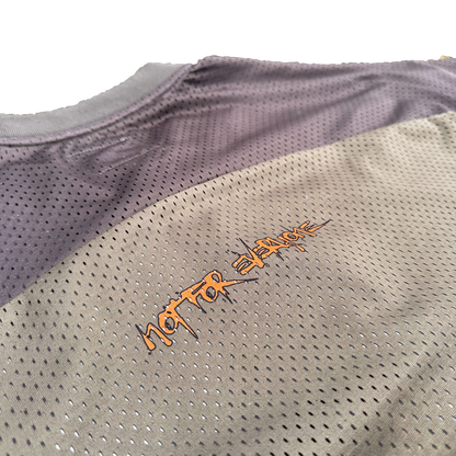 Close-up of the "Not For Everyone" and ribbed fabric details on the Off The Grid jersey.